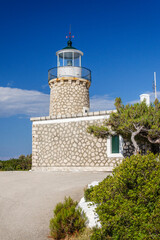 Fototapeta na wymiar Skinari lighthouse on the north of Zakynthos island on Ionian Sea, Greece.