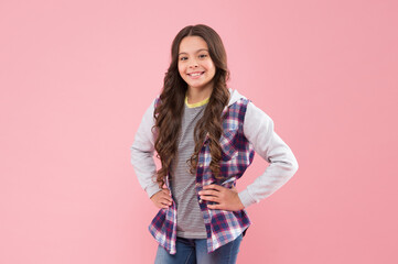 I love fashion. Happy girl with fashion look pink background. Little fashionista in casual style. Clothing trends. Trendy apparel. Stylish clothes for kids. Girls fashion. Discover your new outfit