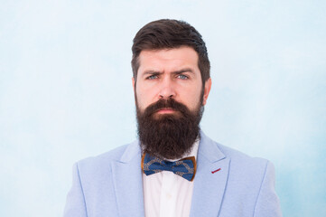 Fashionable hipster man wear fancy tuxedo bow tie elegant gentleman, wedding day concept