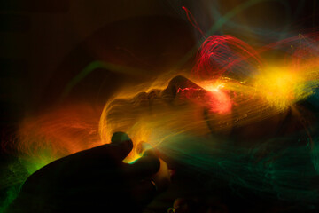 light painting portrait, new art direction, long exposure photo without photoshop, light drawing at long exposure