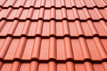 House roof with classical orange tiles, texture, background