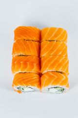 Sushi rolls philadelphia classic with fresh salmon and cream cheese. Japanese traditional food