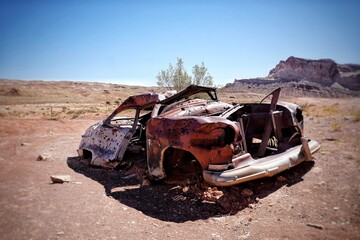 old abandoned car in the desert