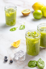 green vegetable juice with spinach and fruits