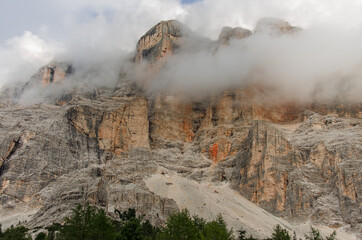 East face of Sasso di Santa Croce mountain range vertical wall, 900 meters high in eastern Dolomites at sunset seen from St. Croce refuge, 2045 meters, Badia valley, Alta Badia, South Tirol, Italy.