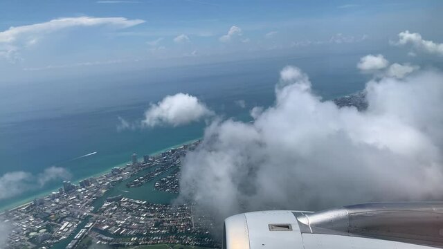 Aerial view of barrier island from airplane window