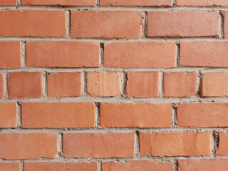 The texture of the walls of red brick. External part of the wall, brickwork.