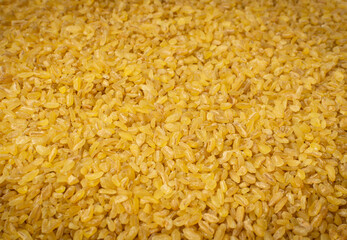 Bulgur, Bulgour or Bulghur Grains Texture Background