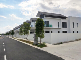 Fototapeta na wymiar SEREMBAN, MALAYSIA -APRIL 07, 2020: New double story luxury terrace house under construction in Malaysia. Designed by an architect with a modern and contemporary style. 