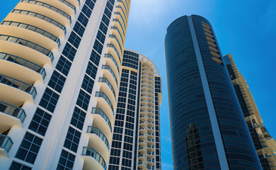 Fototapeta na wymiar Miami, USA - MAY, 2020: Skyscrapers against the blue sky. The property. Business and Finance, Miami Offices.