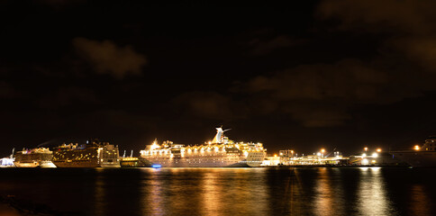Fototapeta premium Miami, Florida, USA - MAY, 2020: A cruise ship. Night life. Tourism. Traveling on the ocean around the world. Port.
