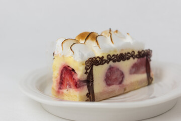 a piece of cake on a white dish