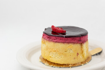 cake with raspberry on top