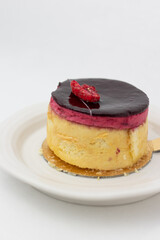 cake with raspberry on top