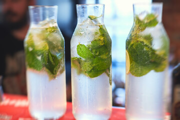 View of lemonade bar on a catering banquet table on party event, beverage selection variety on a party event