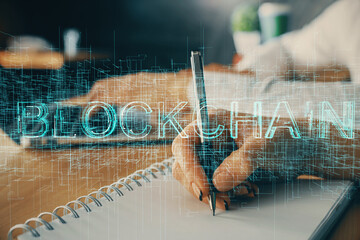 Double exposure of blockchain theme drawing over people taking notes background. Concept of...
