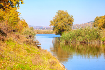 Early Autumn Scenery with Lake . Fishing in the fall season