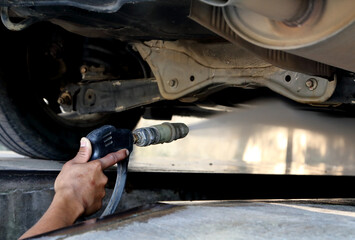 Wash under the car with a high-pressure cleaner