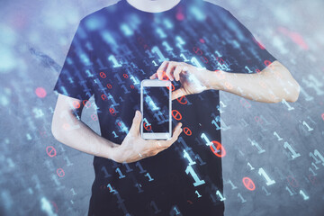 Double exposure of man's hand holding and using a digital device and data theme hologram drawing. Technology concept.