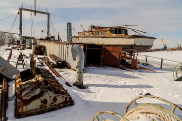 rusty lifeboat on a frozen abandoned ship