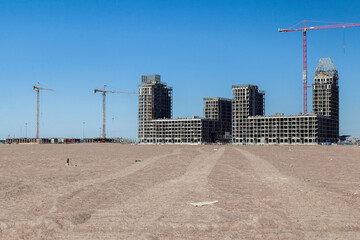 Construction site of new apartment house in desert