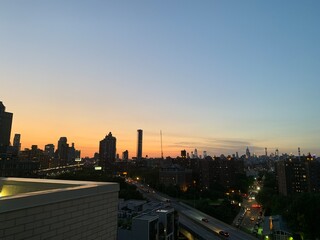 Fototapeta na wymiar Balcony view of sunset city skyline 