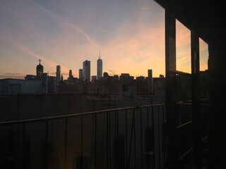 Balcony view of sunset city skyline 