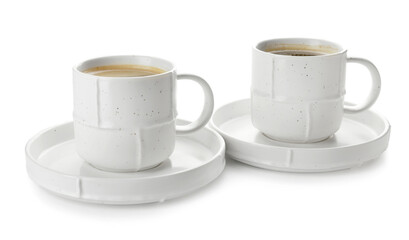 Cups of hot coffee on white background