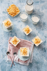 Delicious cupcakes in jars on color background