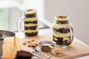 Preparing of delicious cupcake in jar