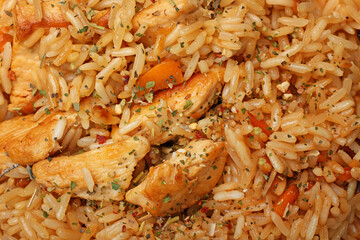 Tasty cooked pilaf as background