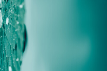 turquoise blurred abstraction with water drops and drips