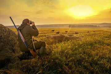 Bird Hunting - Silhouette Hunter At Sunset.