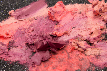 Lipstick swatches on a Black glittery background