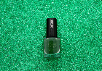 Green nail polish on a Glittery background