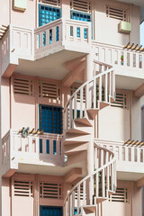 A spiral staircase in the alley of Singapore