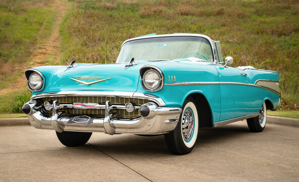 Front side view of an aqua color 1957 Chevrolet Bel Air convertible classic car on October 21, 2017, in Westlake, Texas.