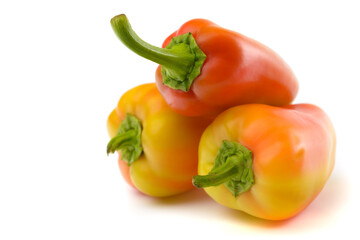 colored sweet pepper close-up on a white isolated background, space for text.horizontal view