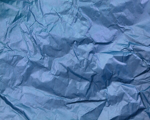 Obraz premium Crumpled blue paper texture background 