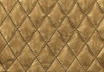 Gold leather background. Empty texture
