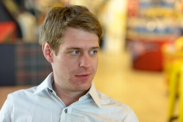 Obraz premium Handsome Scandinavian businessman with blond hair indoors