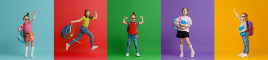 Kids with backpacks on colorful background