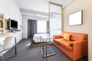 Pictures of living rooms and bedrooms in a modern suite at a urban condominium