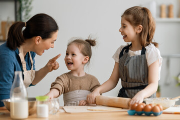 family are preparing bakery together