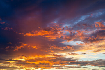 Naklejka na ściany i meble Colorful dramatic sky and cloud at sunset