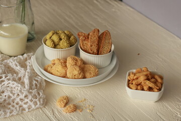 Assorted nice biscuits on the table.