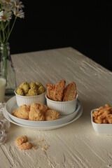 Assorted nice biscuits on the table.