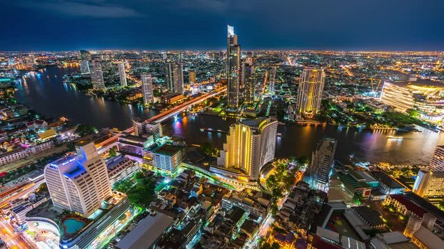time lapse of Bangkok city with Chao Phraya River at night, Thailand