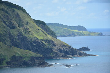 Fototapeta premium Rock formation and sea water at mountain view white beach resort