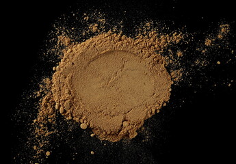 Ginger root powder isolated on black background, Zingiber officinale, top view